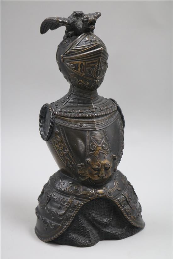 A bronze knight desk stand